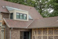 Klinker, Fachwerk und eine schöne Dachansicht mit Dachziegel Walther Stylist in cottage mit Fokus auf die Gaube