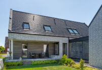 Klinkerhaus mit Flachziegel in edelnero, außergewöhnliche Hausform mit Terrasseneinblick