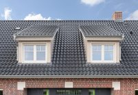 Landhaus mit Klinkerfassade, Gauben und Hohlfalziegel Z5
