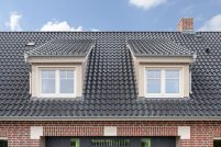 Landhaus mit Klinkerfassade, Gauben und Hohlfalziegel Z5
