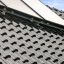 Top Referenz mit sicherer PV Modul Montage: Solarträger universal mit Alugrundpfanne auf Z5 Dach im stilvollen tannengrün